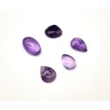 A Set of Five Cabochon Bolivian Amethyst Gemstones. 86.65ct in total.