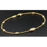 A Chopard 18k Gold and Diamond Bracelet. 18cm. 5.38g total weight. Ref: 11748