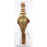 A VINTAGE "RELLIDE" 9K GOLD LADIES WATCH ON EXPANDING STRAP, GOOD WORKING ORDER, 14g.