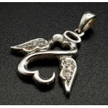 An 18 K white gold, diamond set, pair of swans in a heart shaped pendant/charm. Weight: 2.2. g.