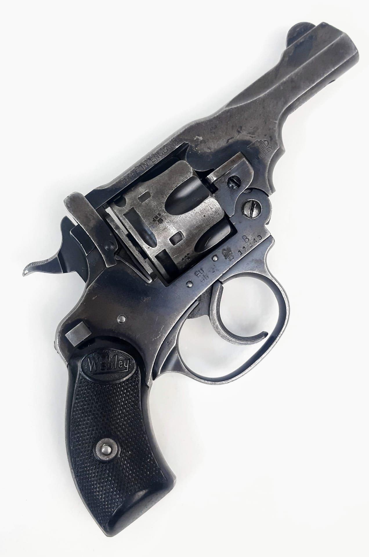 A Deactivated British Webley Mark IV Service Revolver Pistol. Introduced in 1899 and made its mark