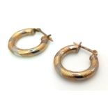 9k 2 colour twist hoop earrings Weighs 1.8g. 1.5cm diameter