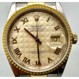 A Rolex Oyster Datejust Bi-Metal Gents Watch. Bi-metal strap and case - 36mm. Cream geometric