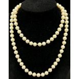 An Opera Length Cultured Pearl Necklace. 28 inches. Pearls - 8mm.