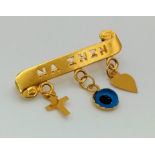 An 18K Yellow Gold Small Child's Brooch with Three Charms. Na Zhsh. 3cm. 1.31g total weight.