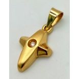 An 18K Yellow Gold and Diamond Star Pendant or Charm. 25mm. 2.29g total weight.