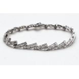 A 14K White Gold Baguette Diamond bracelet, 2ct approx. Weighs 10.72g total weight. 18cm length.