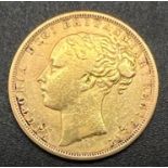 An 1871 Queen Victoria 22K Gold Full Sovereign.