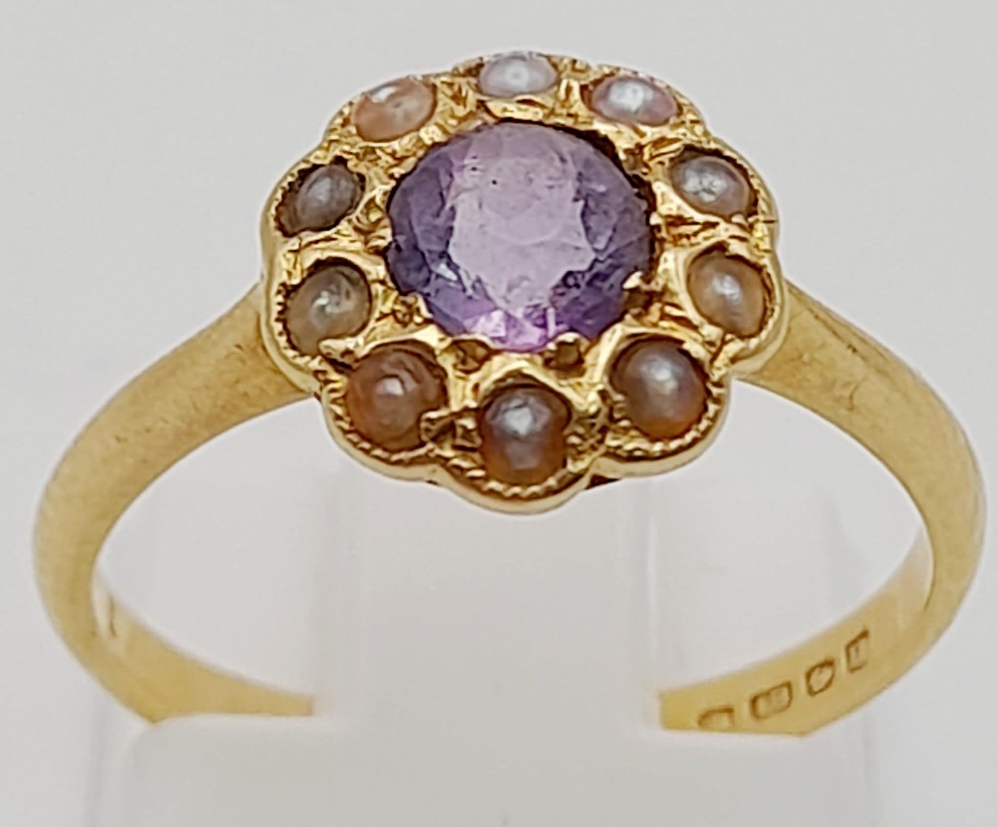 A Vintage 18K Yellow Gold Amethyst and Opal Ring. Central amethyst with a halo of small opals.