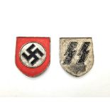 WW2 Waffen SS Tropical Helmet Insignia. Makers Marked J.F.S for Josef Feix & Söhne. Dated 1943.
