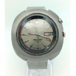 A Rare Vintage Seiko Bell-Matic Gents Watch. Stainless steel strap and case - 42mm. Silver tone dial