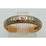 A Vintage 14K Yellow and White Gold Ring. Geometric pattern. Size L. 3.8g.