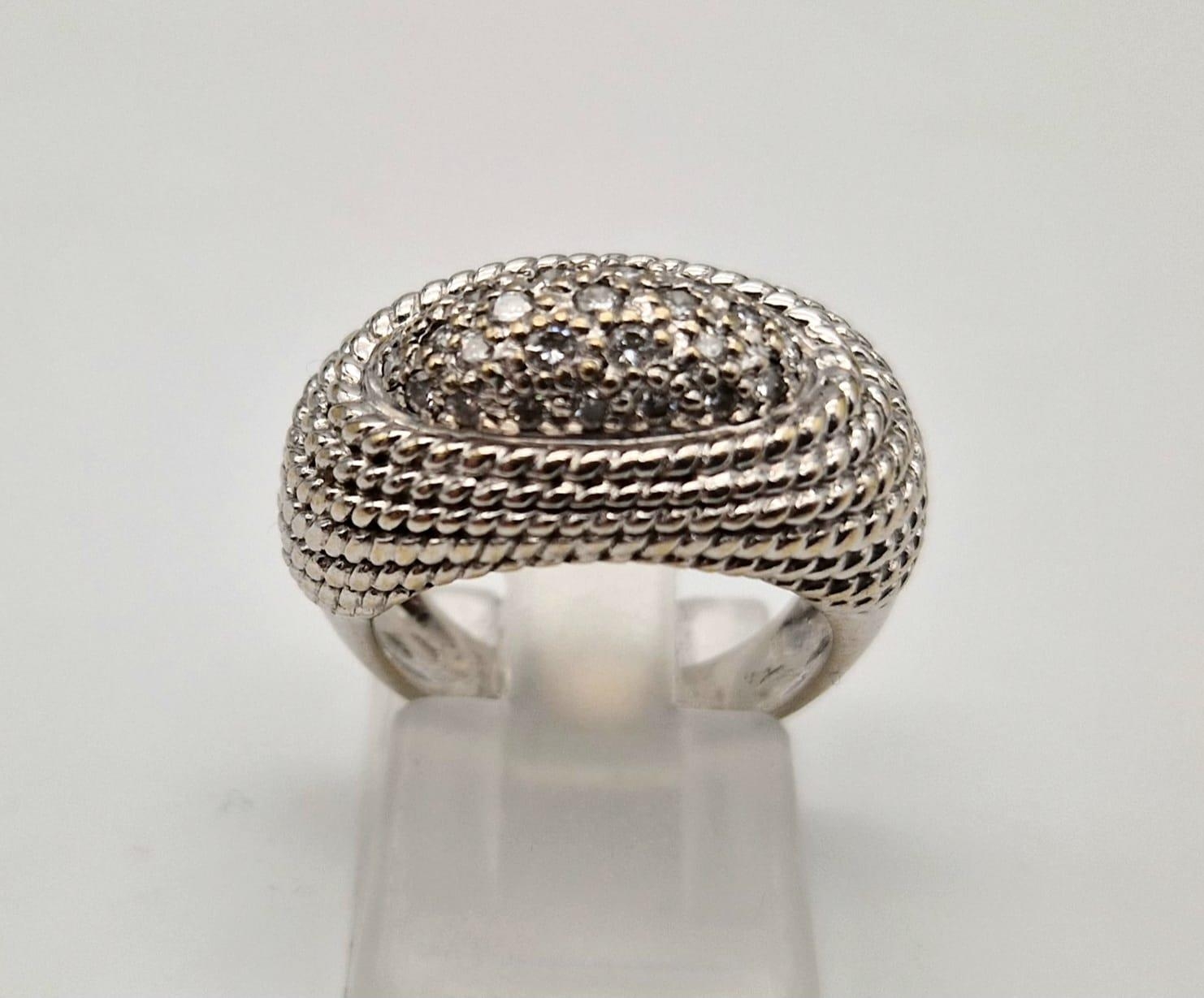 A fancy, 18 K yellow gold, pave diamond (0.25 carats) set ring. Size: I, weight: 9.1 g. - Image 2 of 5