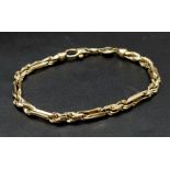 A Gorgeous Italian 14K Yellow Gold Figaro Link Bracelet. 21cm. 22.39g