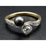 A 14K Yellow Gold Tahitian Grey Pearl and Diamond Ring. 0.5ct diamond and pearl crossover with