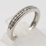 18K WHITE GOLD DIAMOND HALF ETERNITY RING. 0.10CT DIAMOND. TOTAL WEIGHT 2.8G. SIZE K