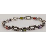 A Lovely Vintage 925 Silver Multi-Colour Gemstone Tennis Bracelet. Amethyst, garnet and peridot.