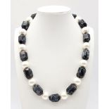 A Unique Hand-Made Gabbro Jasper and Pearl Shell Necklace. Graphite-coloured gabbro elongated