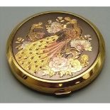 A Vintage Gilded Peacock Design Compact by Stratton. 8cm diameter.