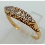 A vintage, 18 K yellow gold and platinum five stone diamond (0.10 carats) ring. Size: K, weight: 3