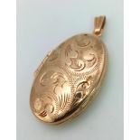 A Vintage 9K Yellow Gold Locket Pendant. Scroll decoration. 4cm. 3.18g