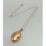 A 9K Yellow Gold Locket Pendant on a 9K Yellow Gold Disappearing Necklace. 3cm and 42cm. 1.32g total