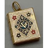 An 18K Gold and Enamel Book Pendant or Charm. 3cm. 4.36g total weight.