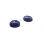 A Pair of Cabochon Tanzanite. 22.85cts in total.