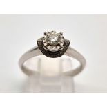 An 18 K white gold diamond ring. Size: M, weight: 3.8 g.