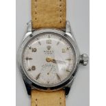 A Vintage Rolex Oyster Precision Watch. Leather strap. Stainless steel case - 30mm. White dial