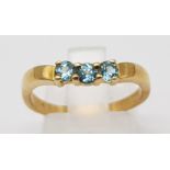 9K YELLOW GOLD TOPAZ 3 STONE RING. WEIGHS 2.5G. SIZE N