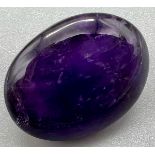 32.30 Ct Natural Amethyst. Purple. Oval Cabochon. Comes with GLI Certificate.