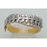 A Fancy 925 Silver Foliage Decorative Ring with Gold Plating throughout. Size S. 5.74g