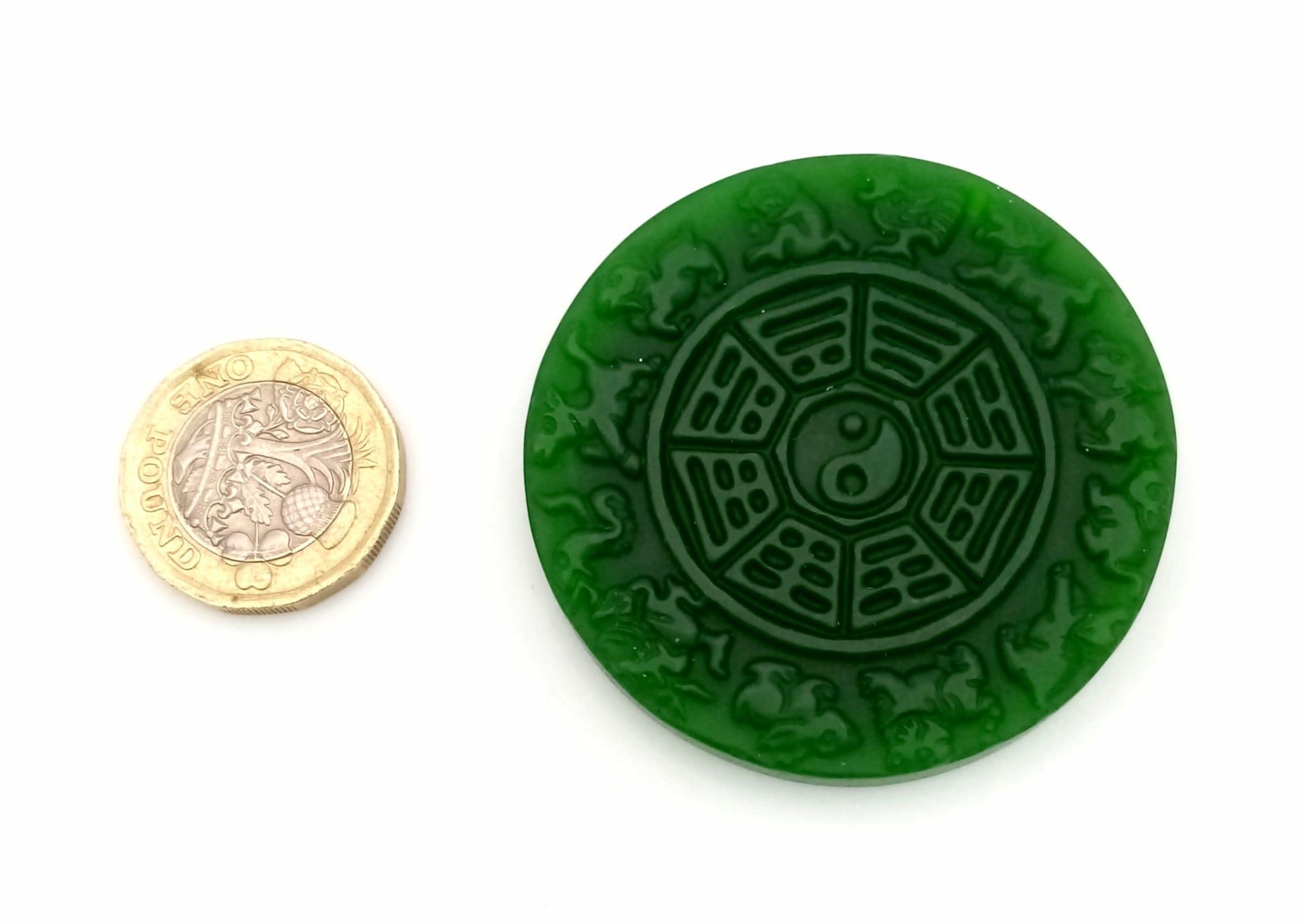 A Chinese Green Jade Astrology Pendant. 5cm diameter. - Image 3 of 3