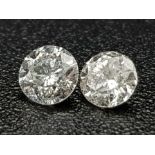 PAIR OF ROUND BRILIANT CUT DIAMONDS TOTAL WEIGHT 0.25CT