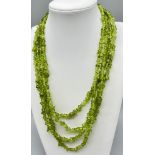 A four strand peridot necklace. Length: 44-53cm, weight: 92 g. Peridot is known to bring good