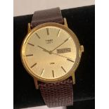 Gentlemans TIMEX Quartz Wristwatch,Day/Date model in Gold Tone, Brown leather strap, Full working