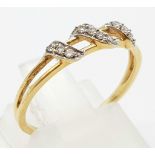 An 18 K yellow gold diamond set ring. Size: M, weight: 1. 4g.