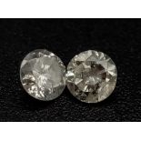 PAIR OF ROUND BRILIANT CUT DIAMONDS 0.32CT TOTAL WEIGHT