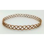 A Vintage 9K Yellow Gold Lattice Bangle. 6.5cm inner diameter. 7.04g