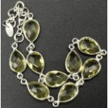 A 925 Silver and Lemon Quartz Teardrop Bracelet. 20cm