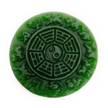 A Chinese Green Jade Astrology Pendant. 5cm diameter.