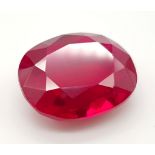 A Glorious Large (46.85ct) Oval Cut Pigeon Blood Red Ruby. Strong fluorescence under UV light, no