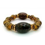 A Very Fashionable Sky Eye Jade and Agate Expandable Bead Bracelet.