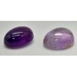 Lot of 2 Gemstones - 24.45ct Amethyst cabochon and a 27.25ct Ametrine cabochon. GLI Certified.