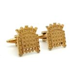 For the one with political aspirations: A pair of cufflinks with the House of Parliament logo. In