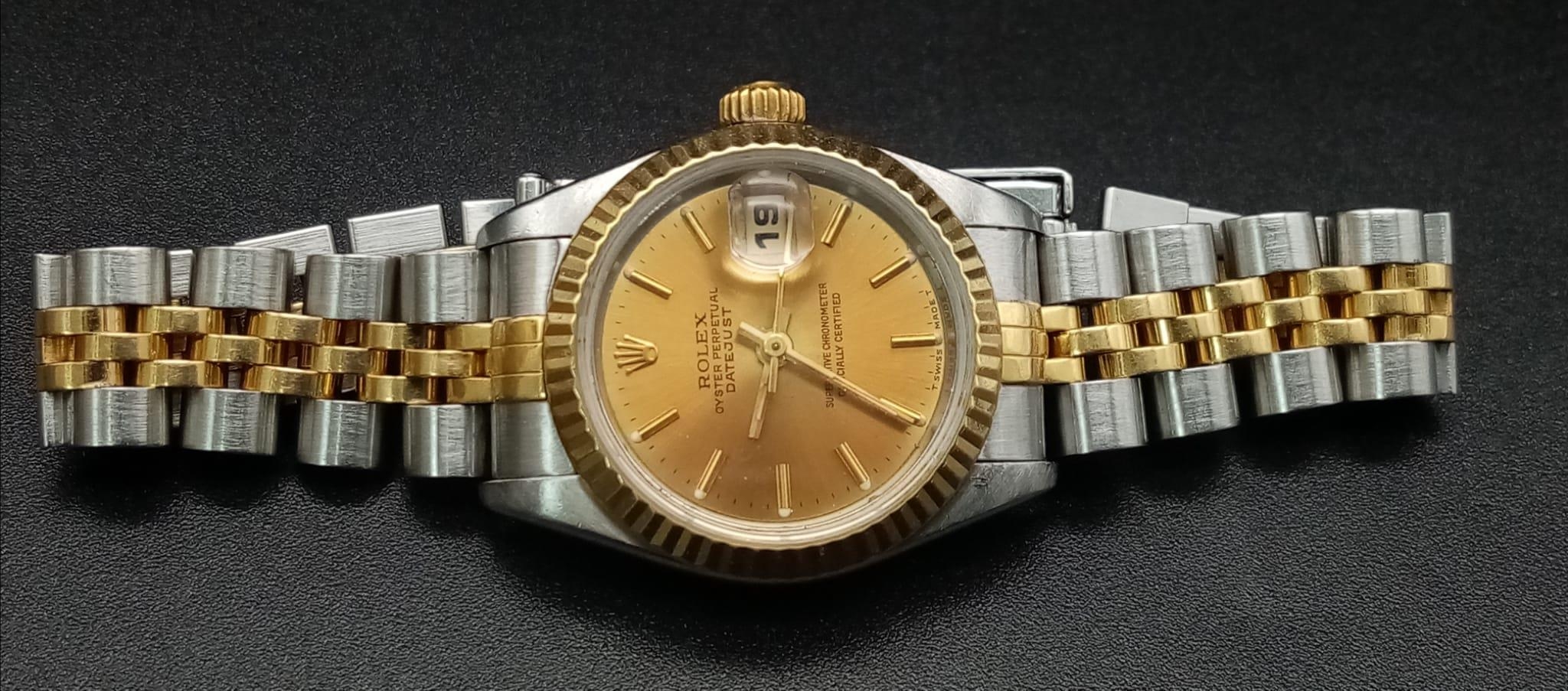 A Rolex Oyster Perpetual Datejust Ladies Watch. Bi-metal strap and case - 26mm. Gold tone dial - Image 8 of 13