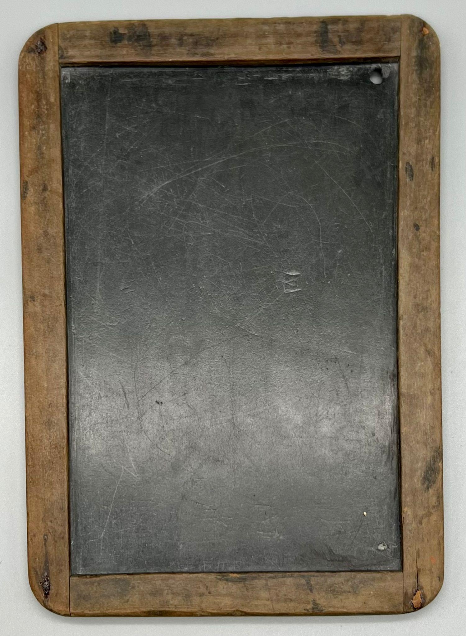 A RARE ANTIQUE 1800'S BUDDHIST TEMPLE SCHOOL CHILDS SLATE BOARD IN WOODEN FRAME. 17 X 23cms APPROX