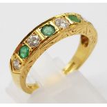 18K YELLW GOLD DIAMOND & EMERALD HALF ETERNITY RING. 0.30CT DIAMONDS APPROX. WEIGHS 4.3G. SIZE O