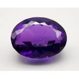 A Beautiful 28ct Deep Purple Coloured (possibly amethyst) Gemstone. Oval cut. 15 x 20mm. No